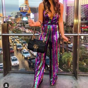 Express, colorful, sequenced jumpsuit.